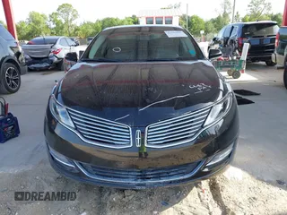 2014 Lincoln MKZ Hybrid z VIN 3LN6L2LU5ER831041, wystawiony jako IAAI lot #42447895 z przebiegiem 92 102 mil mil oraz . Historia ofert i sprzedaży dostępna na DreamBid. Obrazek 12.