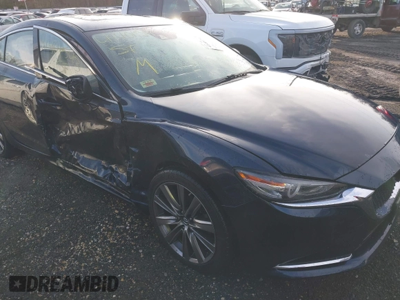 2018 Mazda Mazda6 Grand Touring Reserve with VIN JM1GL1WY9J1321670, listed as a IAAI auction lot 41401543 with 33,679 mi miles. Bid and sale history available at carsss.com. Image 6.