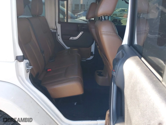 2016 Jeep Wrangler Unlimited 75th Anniversary with VIN 1C4BJWEG3GL194420, listed as a IAAI auction lot 41678849 with 127,194 mi miles. Bid and sale history available at carsss.com. Image 8.