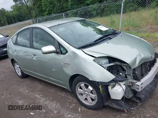 2007 Toyota Prius z VIN JTDKB20U777638541, wystawiony jako IAAI lot #42365060 z przebiegiem 168 456 mil mil oraz . Historia ofert i sprzedaży dostępna na DreamBid. Obrazek 1.