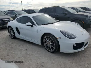 2014 Porsche Cayman S с VIN WP0AB2A84EK191321, выставлен на аукционе Copart как лот 75730564 с пробегом 28 435 миль миль и Списание • Salvage title. История ставок и продаж доступна на DreamBid. Изображение 4.