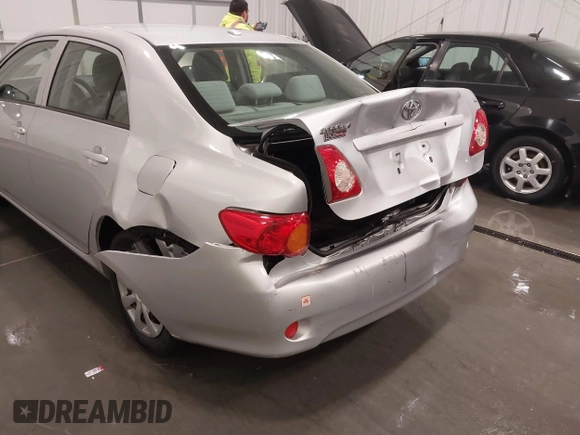 2009 Toyota Corolla with VIN JTDBL40E099056290, listed as a IAAI auction lot 42039105 with 94,043 mi miles and . Bid and sale history available at carsss.com. Image 6.