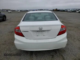 2012 Honda Civic LX z VIN 19XFB2F53CE354965, wystawiony jako Copart lot #59397555 z przebiegiem 181 610 mil mil oraz Szkoda całkowita • Salvage title. Historia ofert i sprzedaży dostępna na DreamBid. Obrazek 6.