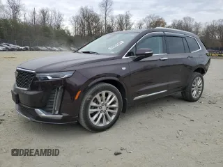 2021 Cadillac XT6 Premium Luxury with VIN 1GYKPDRS5MZ191412, listed as a Copart auction lot 82083504 with 36,092 mi miles and Salvage Title. Bid and sale history available at carsss.com. Image 1.