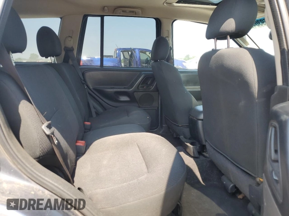 2002 Jeep Grand Cherokee Laredo with VIN 1J4GW48S92C319161, listed as a Copart auction lot 59304035 with 257,907 mi miles and Salvage title. Bid and sale history available at DreamBid. Image 11.