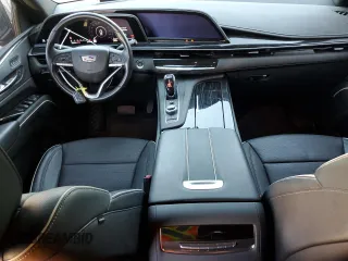 2021 Cadillac Escalade z VIN 1GYS3PKL6MR288828, wystawiony jako Copart lot #78219414 z przebiegiem 22 362 mil mil oraz Czysty tytuł • Clean title. Historia ofert i sprzedaży dostępna na DreamBid. Obrazek 8.