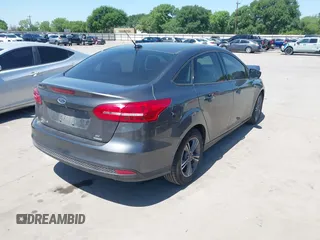 2018 Ford Focus SE with VIN 1FADP3FE3JL204220, listed as a IAAI auction lot 41972960 with 62,682 mi miles and . Bid and sale history available at DreamBid. Image 4.