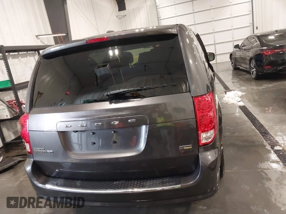 2019 Dodge Grand Caravan SE with VIN 2C4RDGBG9KR527770, listed as a IAAI auction lot 41571473 with 101,310 mi miles and . Bid and sale history available at DreamBid. Image 17.
