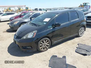 2013 Honda Fit Sport with VIN JHMGE8H57DC049293, listed as a IAAI auction lot 41757899 with 113,963 mi miles. Bid and sale history available at carsss.com. Image 2.