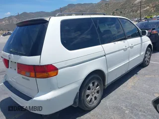 2003 Honda Odyssey EX-L z VIN 5FNRL18033B095684, wystawiony jako IAAI lot #42289617 z przebiegiem 174 336 mil mil oraz . Historia ofert i sprzedaży dostępna na DreamBid. Obrazek 4.