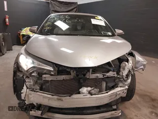 2018 Toyota C-HR XLE z VIN NMTKHMBX5JR039263, wystawiony jako IAAI lot #42265976 z przebiegiem 88 253 mil mil oraz . Historia ofert i sprzedaży dostępna na DreamBid. Obrazek 13.