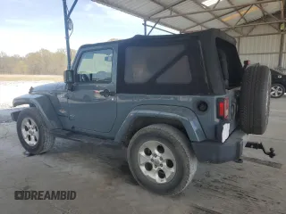 2015 Jeep Wrangler Sahara z VIN 1C4AJWBG9FL729104, wystawiony jako Copart lot #51065615 z przebiegiem 216 779 mil mil oraz Czysty tytuł • Clean title. Historia ofert i sprzedaży dostępna na DreamBid. Obrazek 2.