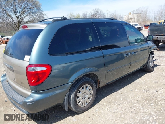 2005 Chrysler Town & Country LX with VIN 2C4GP44R75R267644, listed as a IAAI auction lot 42122611 with 107,802 mi miles and . Bid and sale history available at DreamBid. Image 4.