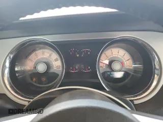 2010 Ford Mustang V6 with VIN 1ZVBP8AN6A5128015, listed as a Copart auction lot 59201315 with 143,591 mi miles and Salvage title. Bid and sale history available at DreamBid. Image 9.