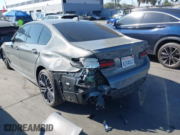 2022 BMW 5 Series M550i xDrive with VIN WBA13BK02NCJ61943, listed as a IAAI auction lot 41607980 with Not provided miles and . Bid and sale history available at DreamBid. Image 3.