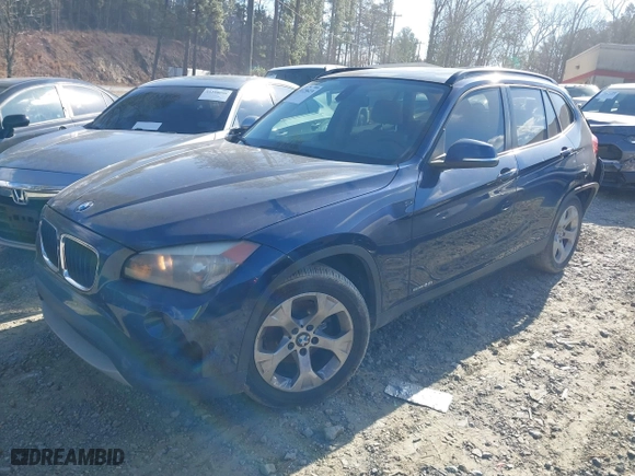 2013 BMW X1 28i with VIN WBAVM1C52DVW46153, listed as a IAAI auction lot 41236419 with 160,732 mi miles. Bid and sale history available at carsss.com. Image 2.