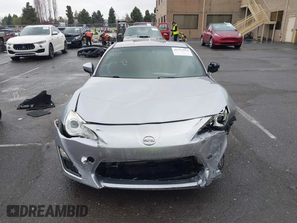 2016 Scion FR-S with VIN JF1ZNAA1XG8709798, listed as a IAAI auction lot 41713314 with 139,450 mi miles. Bid and sale history available at carsss.com. Image 13.