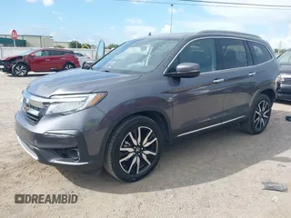 2022 Honda Pilot Elite with VIN 5FNYF6H04NB025212, listed as a IAAI auction lot 42430032 with 69,427 mi miles and . Bid and sale history available at DreamBid. Image 17.