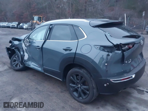 2023 Mazda CX-30 S Carbon Edition with VIN 3MVDMBCM5PM545150, listed as a IAAI auction lot 41104881 with 30,459 mi miles and . Bid and sale history available at DreamBid. Image 3.