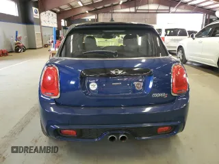 2017 MINI Hardtop 4 Door Cooper S z VIN WMWXU3C32H2B64327, wystawiony jako Copart lot #58888045 z przebiegiem 160 394 mil mil oraz Tytuł czysty. Historia ofert i sprzedaży dostępna na DreamBid. Obrazek 6.