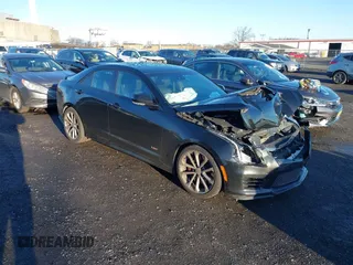 2017 Cadillac ATS-V with VIN 1G6AN5RY5H0118796, listed as a IAAI auction lot 41148690 with 101,736 mi miles. Bid and sale history available at carsss.com. Image 1.
