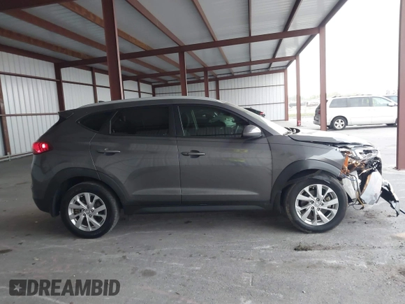 2021 Hyundai Tucson Value z VIN KM8J33A47MU309988, wystawiony jako IAAI lot #41749644 z przebiegiem 61 197 mil mil oraz . Historia ofert i sprzedaży dostępna na DreamBid. Obrazek 13.
