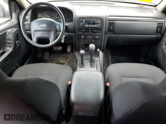 2004 Jeep Grand Cherokee Laredo with VIN 1J4GW48S64C160831, listed as a Copart auction lot 61920005 with 135,243 mi miles and Clean title. Bid and sale history available at DreamBid. Image 8.