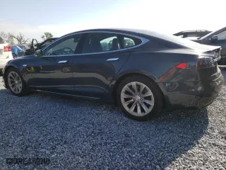 2016 Tesla Model S 90D with VIN 5YJSA1E22GF159054, listed as a Copart auction lot 52079565 with 89,380 mi miles and Salvage Title. Bid and sale history available at carsss.com. Image 2.