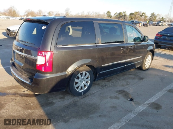 2014 Chrysler Town & Country Touring with VIN 2C4RC1BGXER124367, listed as a IAAI auction lot 41888366 with 143,638 mi miles and . Bid and sale history available at DreamBid. Image 4.