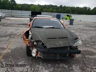 2006 Hyundai Tiburon GT z VIN KMHHN65F66U191134, wystawiony jako Copart lot #56692615 z przebiegiem 197 093 mil mil oraz Szkoda całkowita • Salvage title. Historia ofert i sprzedaży dostępna na DreamBid. Obrazek 14.