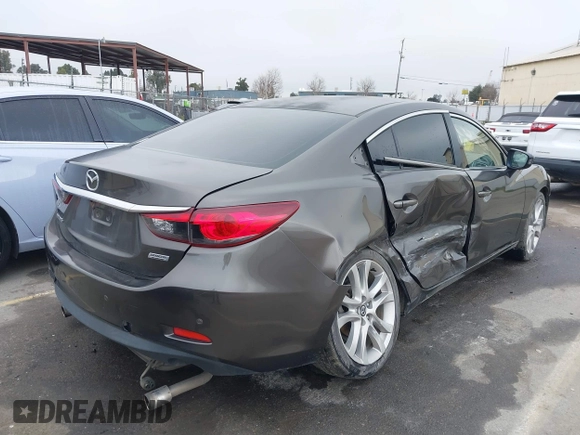 2016 Mazda 6 i Touring with VIN JM1GJ1V52G1473330, listed as a IAAI auction lot 41657684 with 138,064 mi miles and . Bid and sale history available at DreamBid. Image 4.