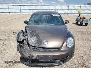 2012 Volkswagen Beetle 2.5L with VIN 3VWHX7AT2CM616099, listed as a Copart auction lot 56421455 with 225,279 mi miles and Salvage title. Bid and sale history available at DreamBid. Image 5.