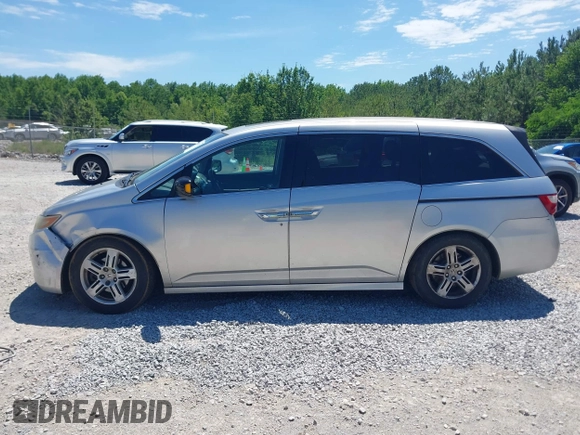 2012 Honda Odyssey Touring с VIN 5FNRL5H99CB008201, выставлен на аукционе IAAI как лот 42308147 с пробегом 217 715 миль миль и . История ставок и продаж доступна на DreamBid. Изображение 14.