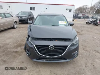 2014 Mazda 3 S Touring with VIN JM1BM1L30E1200337, listed as a IAAI auction lot 41906333 with 92,873 mi miles and . Bid and sale history available at DreamBid. Image 12.