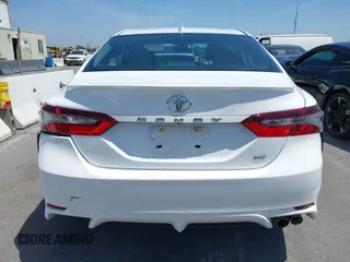 2023 Toyota Camry SE with VIN 4T1G11AK0PU736081, listed as a IAAI auction lot 42090419 with 32,303 mi miles and . Bid and sale history available at DreamBid. Image 16.