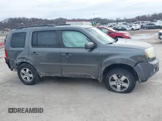 2011 Honda Pilot EX-L with VIN 5FNYF4H59BB042308, listed as a IAAI auction lot 41635511 with 196,736 mi miles and . Bid and sale history available at carsss.com. Image 13.
