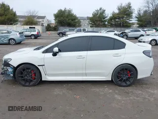 2020 Subaru WRX Premium with VIN JF1VA1B69L9814633, listed as a IAAI auction lot 41455166 with 62,605 mi miles and . Bid and sale history available at DreamBid. Image 14.