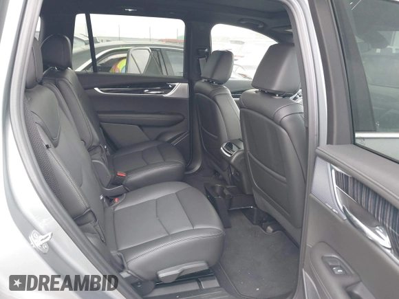 2025 Cadillac XT6 FWD Premium Luxury with VIN 1GYKPCRS4SZ119978, listed as a IAAI auction lot 41877109 with 13,579 mi miles. Bid and sale history available at carsss.com. Image 8.