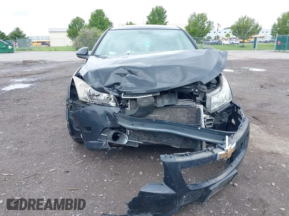 2014 Chevrolet Cruze 1LT z VIN 1G1PC5SB6E7138943, wystawiony jako IAAI lot #42368233 z przebiegiem 119 760 mil mil oraz . Historia ofert i sprzedaży dostępna na DreamBid. Obrazek 12.