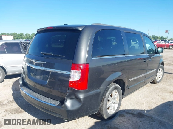 2012 Chrysler Town & Country Touring with VIN 2C4RC1BG1CR401016, listed as a IAAI auction lot 42086972 with 145,373 mi miles. Bid and sale history available at carsss.com. Image 4.