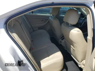 2015 Ford Taurus SEL z VIN 1FAHP2E8XFG181929, wystawiony jako Copart lot #64022325 z przebiegiem 106 272 mil mil oraz Szkoda całkowita • Salvage title. Historia ofert i sprzedaży dostępna na DreamBid. Obrazek 10.