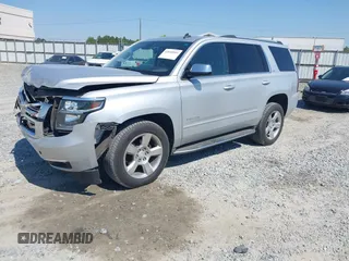 2015 Chevrolet Tahoe LTZ z VIN 1GNSCCKC8FR149888, wystawiony jako IAAI lot #42049804 z przebiegiem 182 991 mil mil oraz . Historia ofert i sprzedaży dostępna na DreamBid. Obrazek 2.
