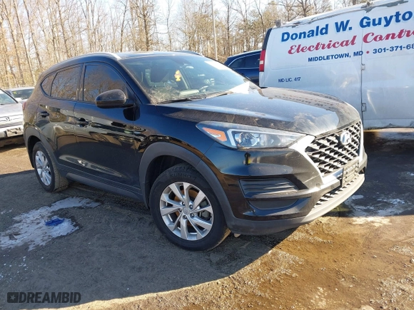2019 Hyundai Tucson Value with VIN KM8J33A4XKU979791, listed as a IAAI auction lot 41255630 with 90,807 mi miles. Bid and sale history available at carsss.com. Image 1.