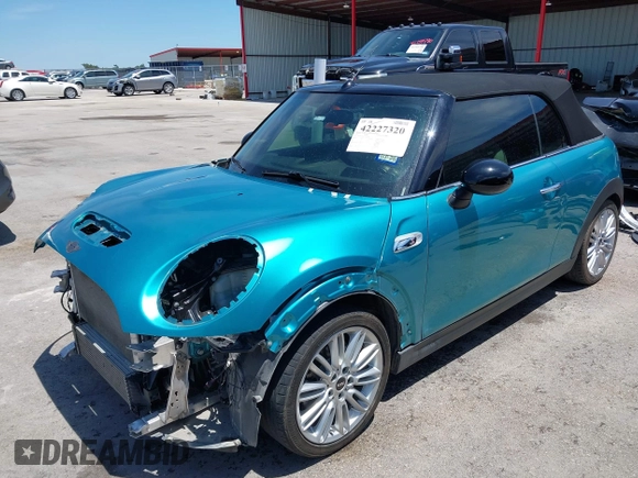 2017 MINI Convertible Cooper S z VIN WMWWG9C30H3C80917, wystawiony jako IAAI lot #42227320 z przebiegiem 38 490 mil mil oraz . Historia ofert i sprzedaży dostępna na DreamBid. Obrazek 20.
