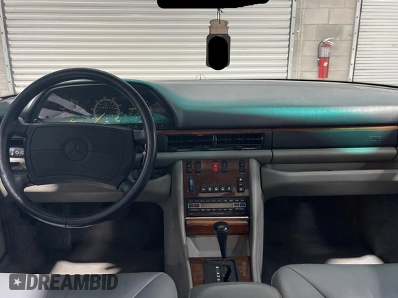 1991 Mercedes-Benz 300 with VIN WDBCA24E7MA571320, listed as a Copart auction lot 56029655 with 89,556 mi miles and Clean Title. Bid and sale history available at DreamBid. Image 9.