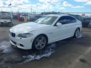 2013 BMW 5 Series 550i with VIN WBAFR9C55DDX79824, listed as a IAAI auction lot 41703036 with 107,166 mi miles and . Bid and sale history available at carsss.com. Image 2.