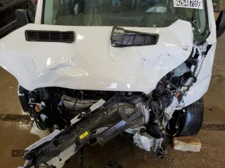 2023 Ford Transit Cargo z VIN 1FTBR1X89PKB01620, wystawiony jako Copart lot #42648755 z przebiegiem Nie podano mil oraz Nie do naprawy • Non repairable. Historia ofert i sprzedaży dostępna na DreamBid. Obrazek 12.