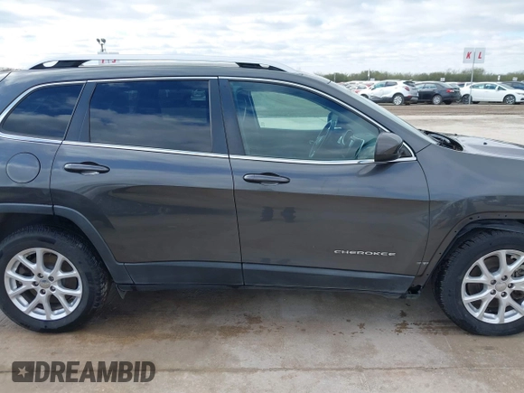 2016 Jeep Cherokee Latitude with VIN 1C4PJLCS2GW190322, listed as a IAAI auction lot 41290901 with 118,513 mi miles. Bid and sale history available at carsss.com. Image 14.
