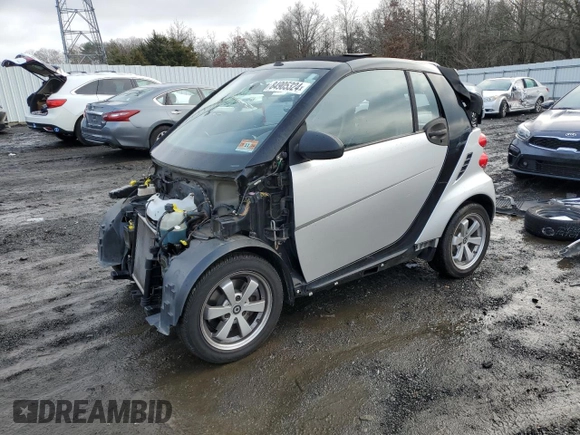 2013 Smart fortwo Passion z VIN WMEEK3BA2DK625180, wystawiony jako Copart lot #84905324 z przebiegiem 53 126 mil mil oraz Szkoda całkowita • Salvage title. Historia ofert i sprzedaży dostępna na DreamBid. Obrazek 1.
