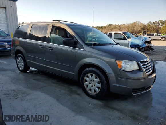 2010 Chrysler Town & Country LX with VIN 2A4RR4DE3AR344191, listed as a Copart auction lot 41399625 with 163,934 mi miles and Salvage Title. Bid and sale history available at DreamBid. Image 4.